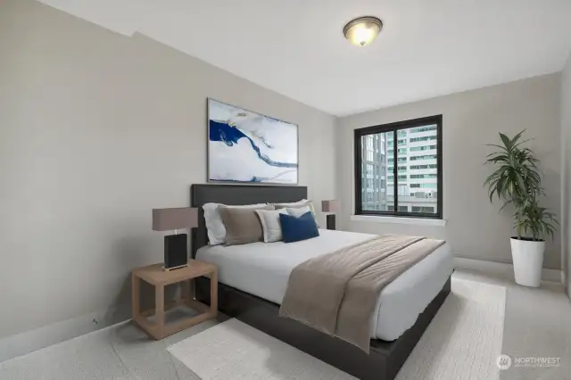 The bedroom window also faces south.  Virtually staged bedroom.