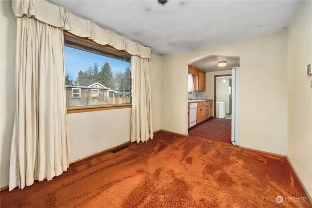 Dining room also has large window for natural light.