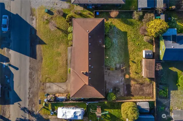 Aerial view of the lot - plenty of parking out front and alley access offers additional parking options.