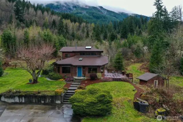 Outbuilding to the right was used as a changing room for a previous hot tub.  Out of view is pump house with Starlink dish.