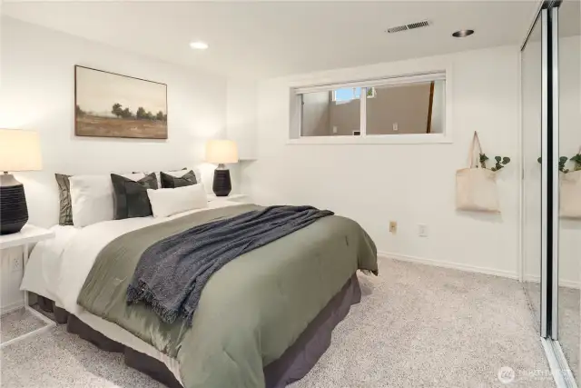 The third bedroom located downstairs features a very large closet and fresh paint.