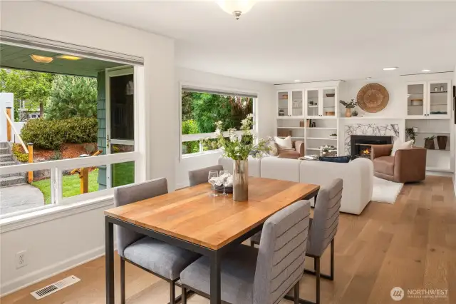 Windows everywhere pour in the natural light with the exterior landscaping providing a lush privacy from the street.