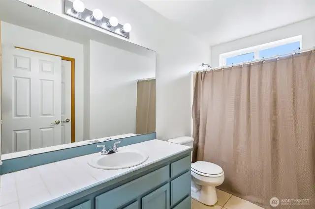 Upper-level guest bathroom.