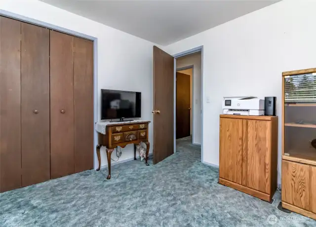 Bedroom 3. Hardwood floors under carpet have been covered since 1970's