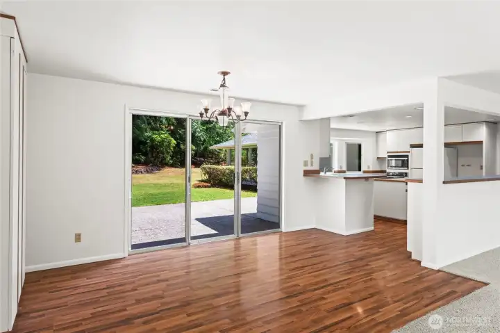 View looking into dining area with access to both the kitchen and backyard.  Perfect for entertaining and back yard bbq,s