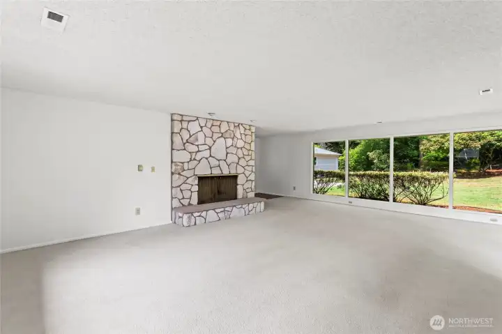 Massive great room/family room looking out into private back yard.