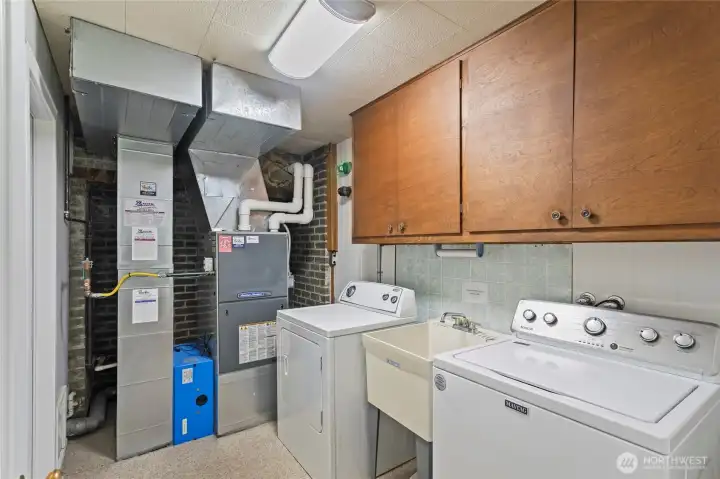 Great sized Laundry Room with sink and plenty of storage space.Newer furnace with recent service.