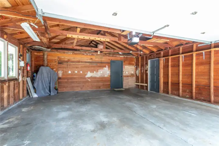 Great sized,Deep garage with tons of of overhead storage.