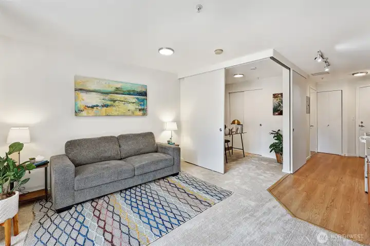 Staged with a Queen sized fold out sofa bed, this space can be used in different ways!