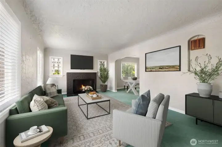 Inviting Living Room with Cozy Fireplace. Photo is virtually staged.