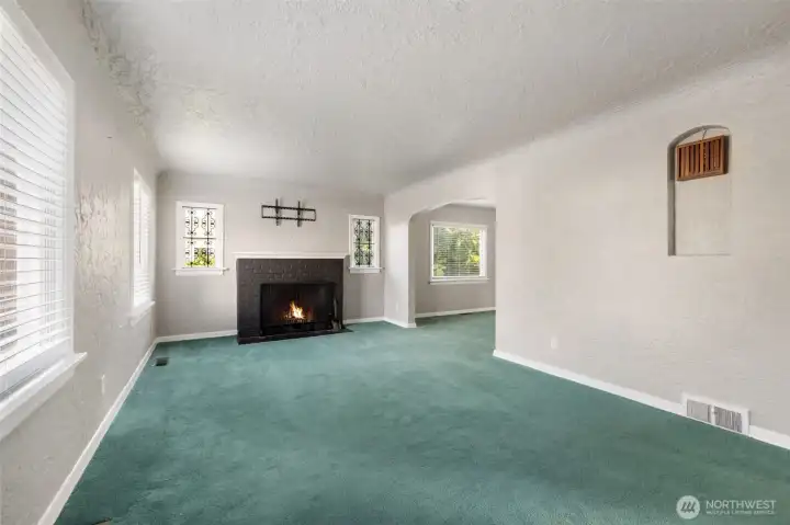 Spacious Living Room with Classic Fireplace Focal Point