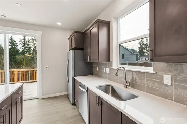 Farm sink and views. Photos are for representational purposes only. Colors and finishes may differ.