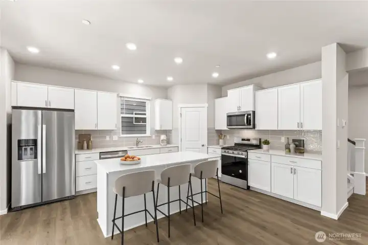 Entertain with style in your beautiful gourmet kitchen.  Photos are for representational purposes only. Colors and finishes may vary