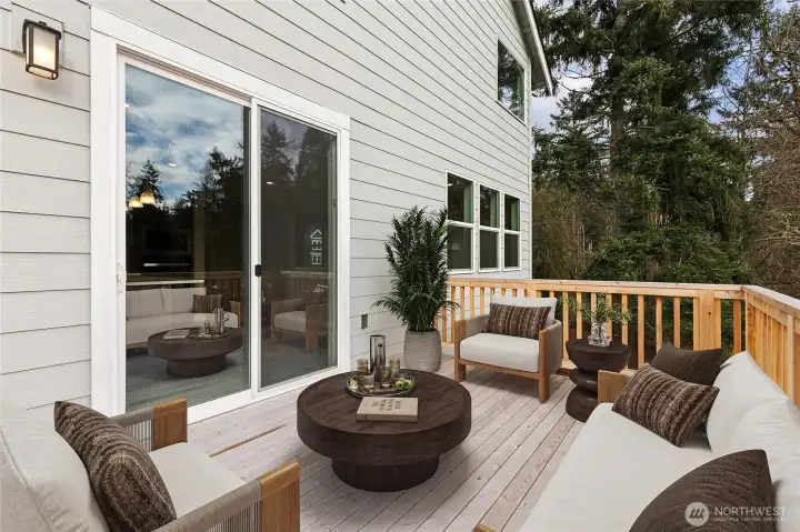 Deck from main floor. Photos are for representational purposes only. Colors and finishes may differ.