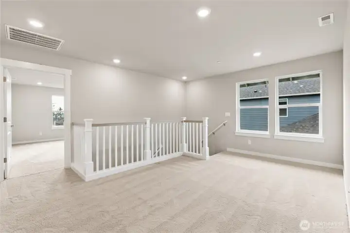 Open rail land loft on upper level. Photos are for representational purposes only. Colors and finishes may differ.