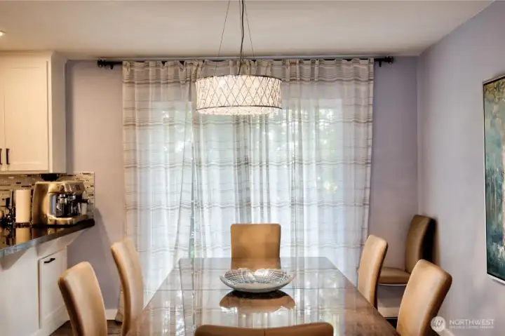 Dining open to kitchen and living room