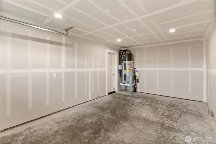 There's also an attached 1-car garage off the ground floor. You can also see the high-efficiency heat pump water heater here as well!