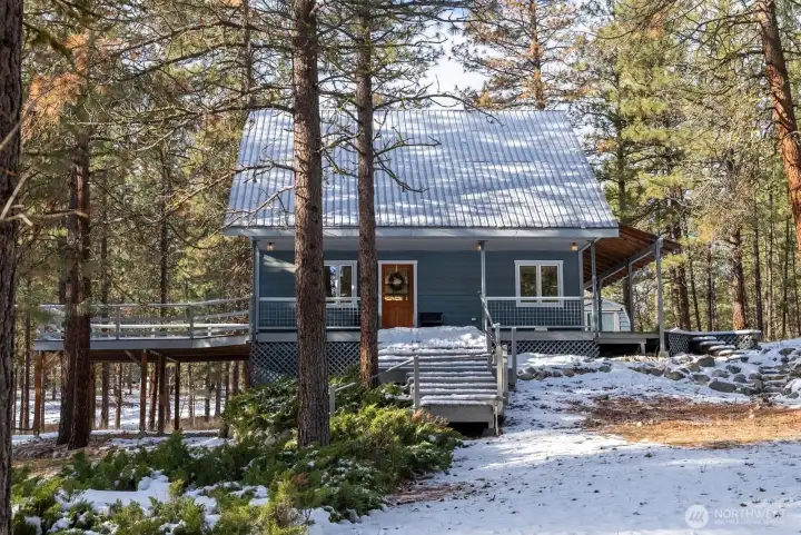 3 Bed /2 Bath home perfectly tucked in to this 1 Acre property surrounded by tall Pine Tree setting. Low maintenance landscape.