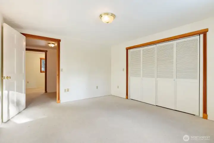 Primary Bedroom is carpeted. Large his/hers closet. Great natural light.