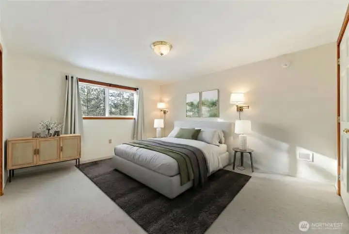 Generous Primary Bedroom on upper level of the home has huge his/hers closet, carpeted, wood trim on picture window for tons of natural light. Restful Primary is all you will need for a great nights sleep after a full day of skiing, hiking, riding, running, biking and more... Forced electric heat.