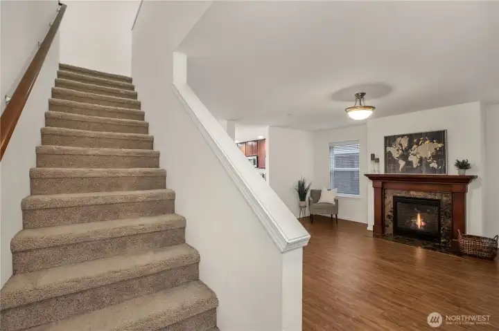 upstairs to additional bedrooms and baths