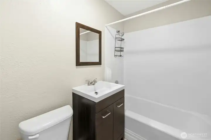 Two full bathrooms in each unit are located upstairs between the bedrooms.