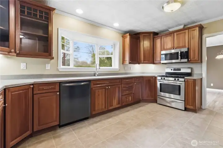 Kitchen with garden window looking into the backyard