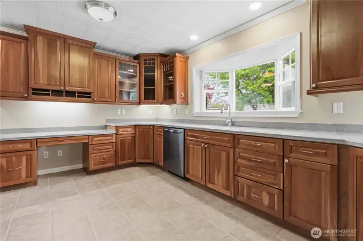 Kitchen with garden window looking into the backyard