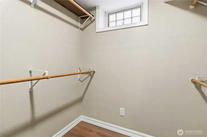 Primary bedroom walk-in closet
