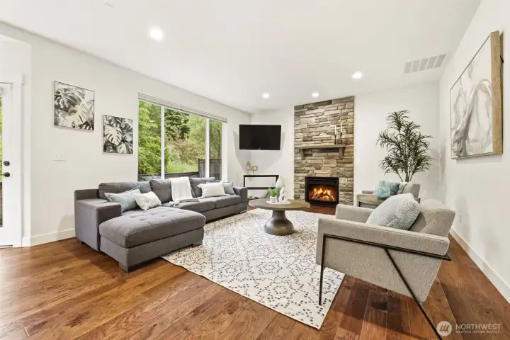 Recreational Living Room w/ stone gas fireplace