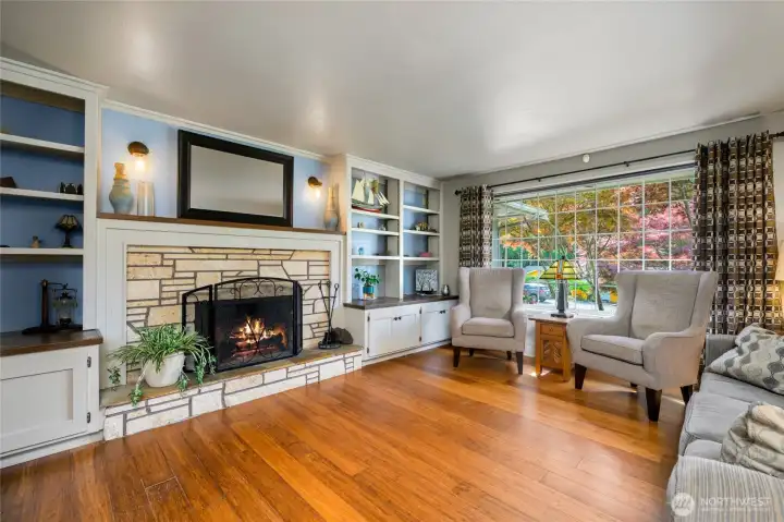The wonderfully rich tones of the floor combined with the breezy blue and white colors of the room make it a place to relax or entertain.