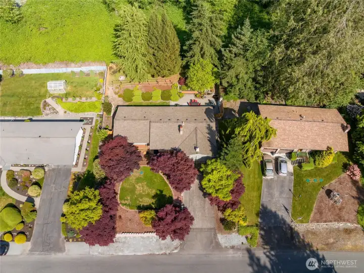 Mature landscaping, sprinkler system, new septic in 2024.