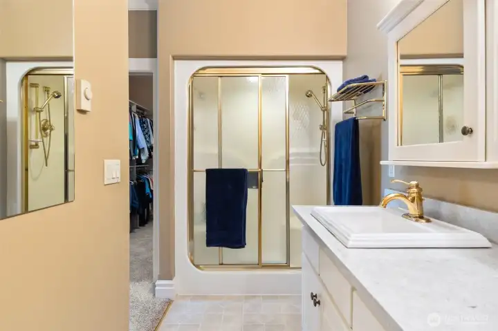 Double vanity and step-in shower. Double vanity and step-in shower.