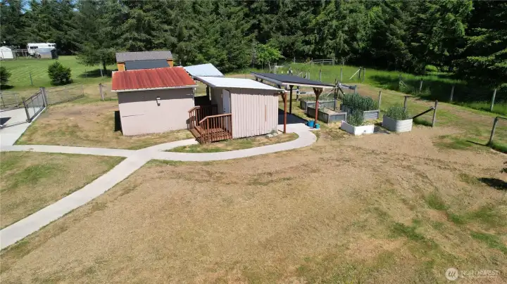 The propety extends beyond that back fence.