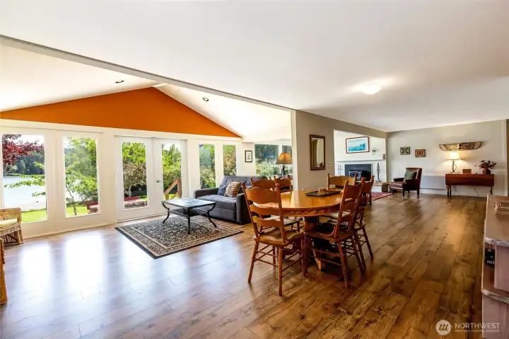 Great room with dining area and French doors to deck