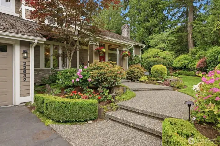 From the moment you arrive, the home’s covered front porch and charming curb appeal set the tone for what awaits inside.