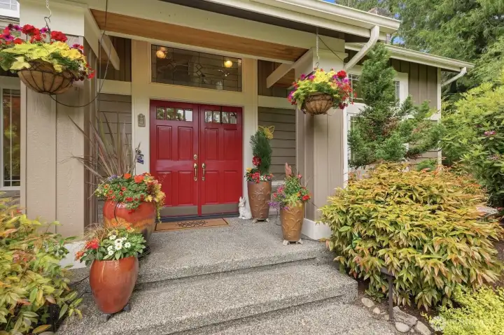 Surrounded by lush gardens, mature landscaping, specimen trees and bushes the residence exudes warmth and character.