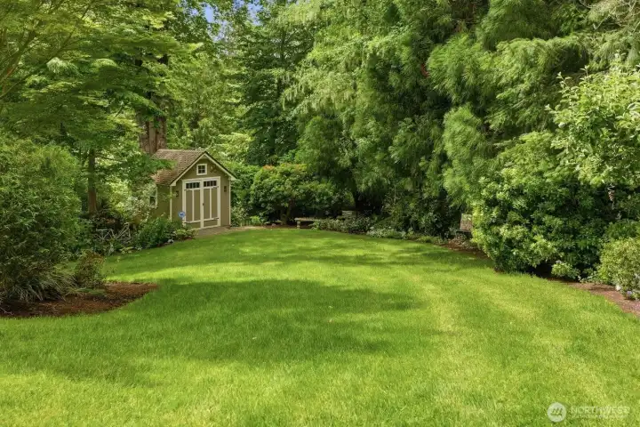With dry river rock beds, large boulders, a shed and trellises, every corner of the property has been thoughtfully designed to maximize beauty and enjoyment while providing privacy and serenity.