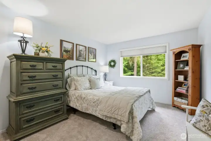 Three additional bedrooms provide comfortable accommodations for family members, guests, or flexible use as hobby rooms and study spaces.