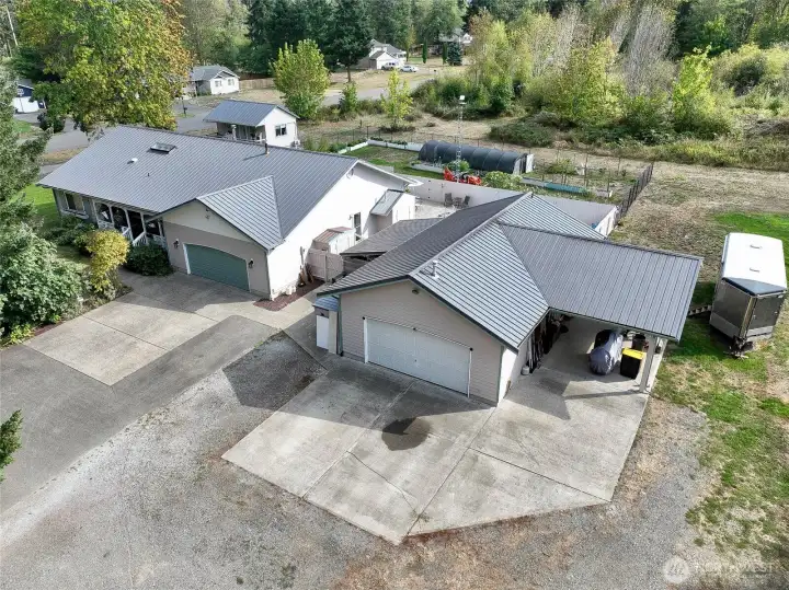 This is a unique property with 3 homes on 1.67 fully useable acres. The main home (a rambler) offers 2,206 sq ft of living space. The second dwelling (on the right) is an 850 sq ft two story apartment with 1 bedroom, 1 bath, bonus room, living & dining areas. Home #3 is a delightful 360 sq ft cottage (back left side) which is beautifully finished. This is a great property for 3 families or a multi-generational scenario. Don't need this much space? The two ADU's represent a great investment with rental income. This is a unique property with 3 homes on 1.67 fully useable acres. The main home (a rambler) offers 2,206 sq ft of living space. The second dwelling (on the right) is an 850 sq ft two story apartment with 1 bedroom, 1 bath, bonus room, living & dining areas. Home #3 is a delightful 360 sq ft cottage (back left side) which is beautifully finished. This is a great property for 3 families or a multi-generational scenario. Don't need this much space? The two ADU's represent a great investment with rental income.