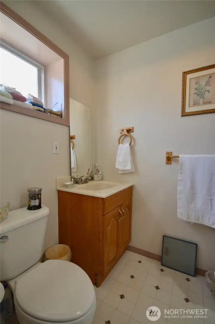 The bathroom is right off the main bedroom. The bathroom is right off the main bedroom.