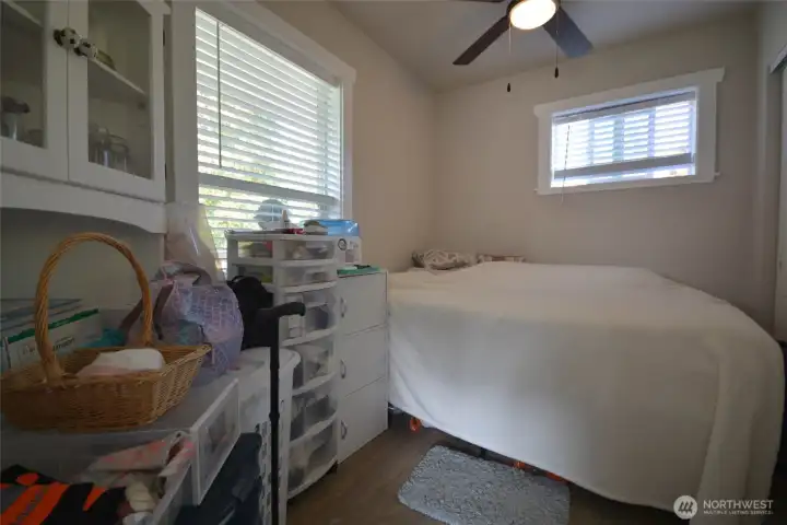 Efficient bedroom with closet and storage. Big windows let in a lot of light. Efficient bedroom with closet and storage. Big windows let in a lot of light.