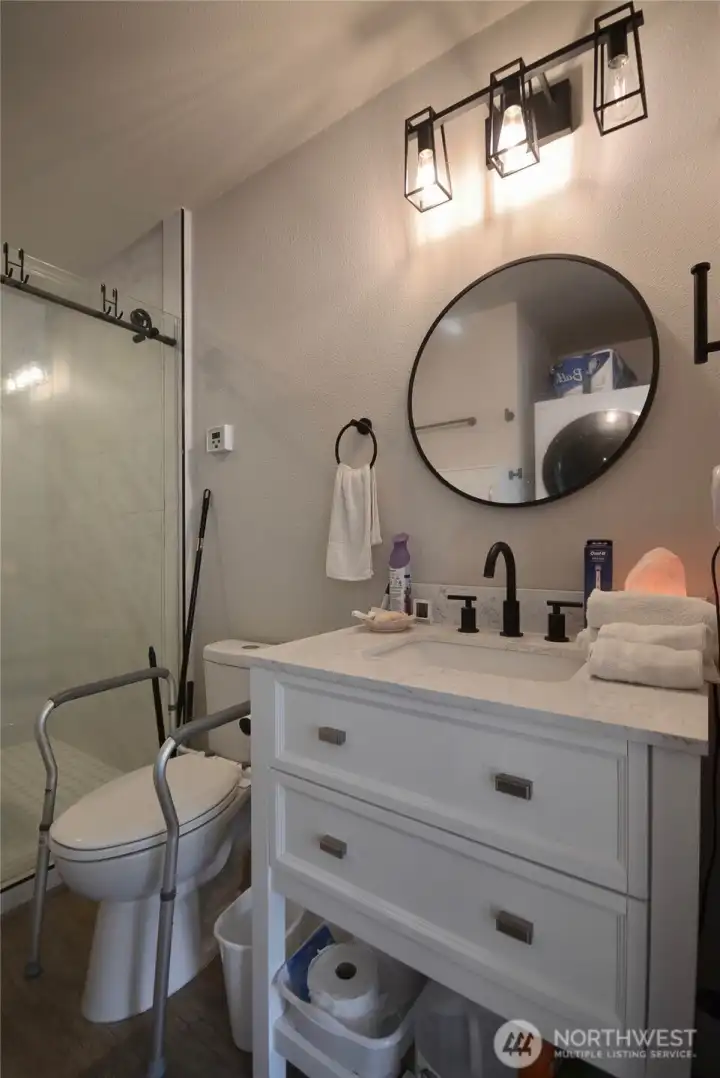 Nice sized bathroom with a walk in shower and the vanity is topped with granite. Nice sized bathroom with a walk in shower and the vanity is topped with granite.