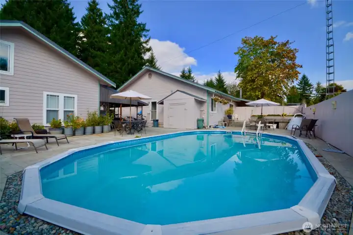 This gorgeous in ground pool measures 18' x 34'. It is heated for use in the cooler months too. It has a solar cover as well as a winter cover (which is a blow up bubble structure). Lots of fun for everyone. This gorgeous in ground pool measures 18' x 34'. It is heated for use in the cooler months too. It has a solar cover as well as a winter cover (which is a blow up bubble structure). Lots of fun for everyone.