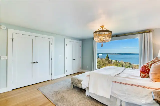 Picture window showcases the amazing view.  Walk-in closet on the right with built-in’s.