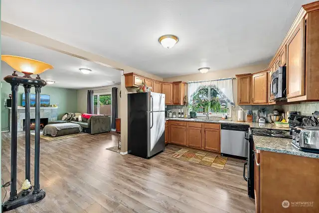 View from kitchen dining area into living room.