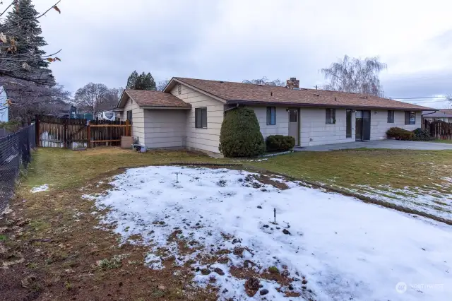 Rear of house, side yard and garden spot