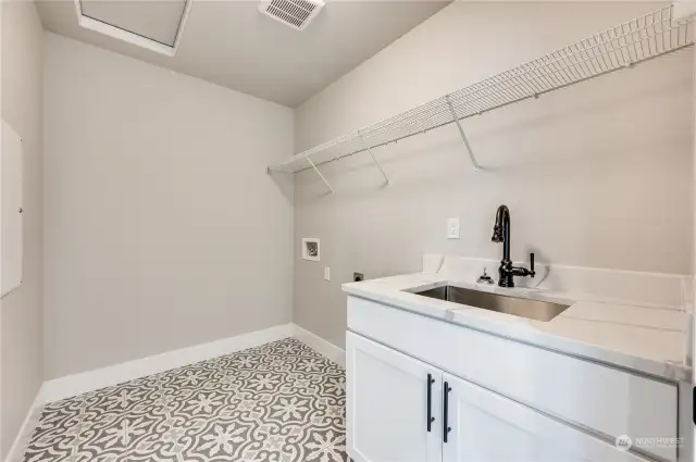 Upstairs Laundry Room - Photos of another 2415 plan at Skyline. Color selections will vary.