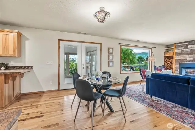 French doors lead to 4-season room...