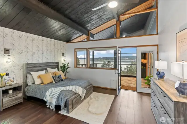 Primary Bedroom with walk-in closet and porch swing. SO Relaxing....